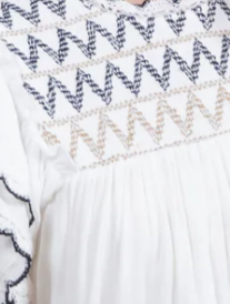 Smocked top by Trisha Tyler