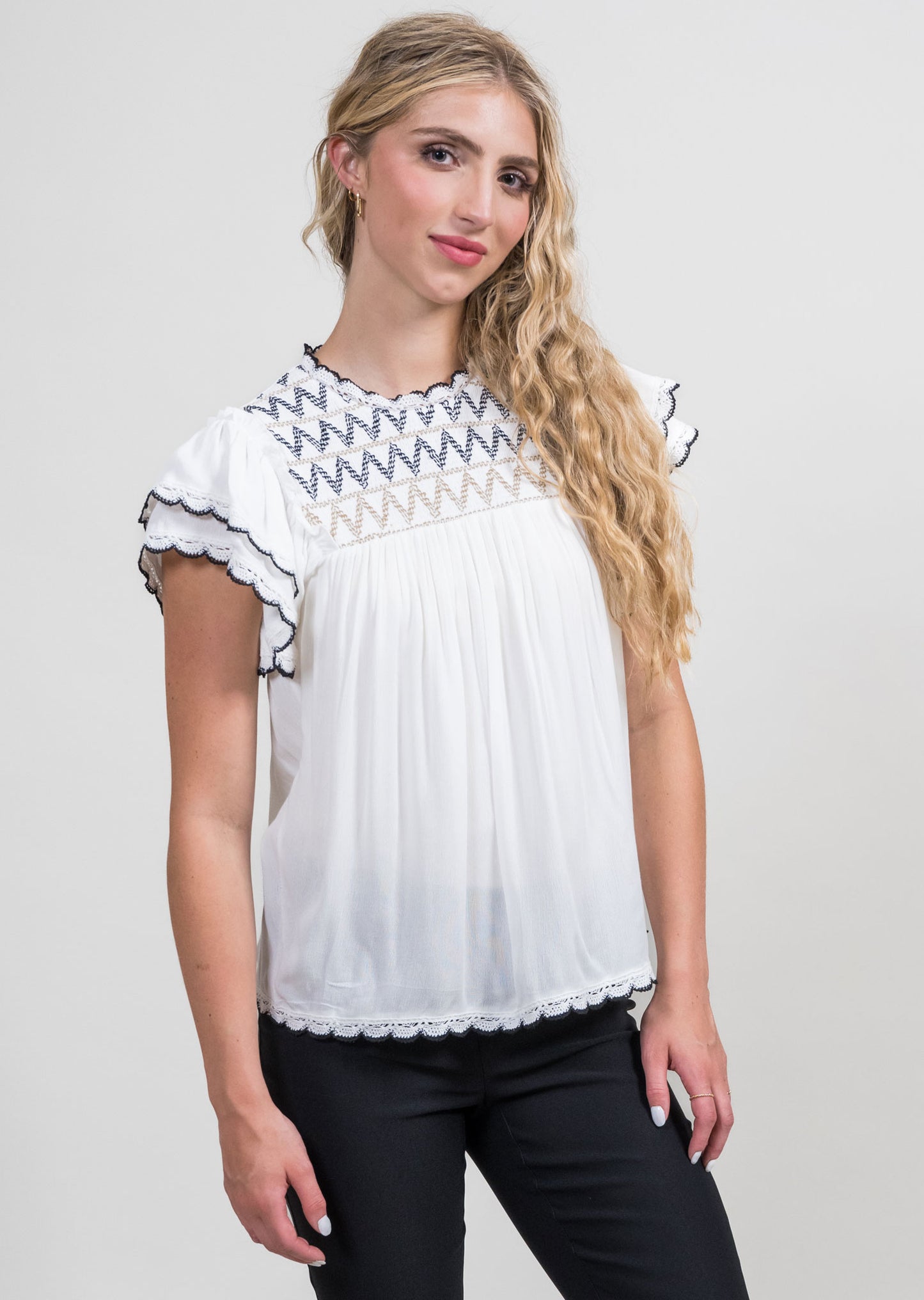 Smocked top by Trisha Tyler